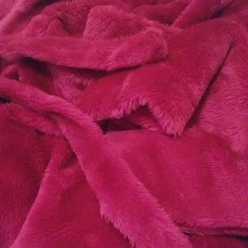 A huge fluffy pink robe